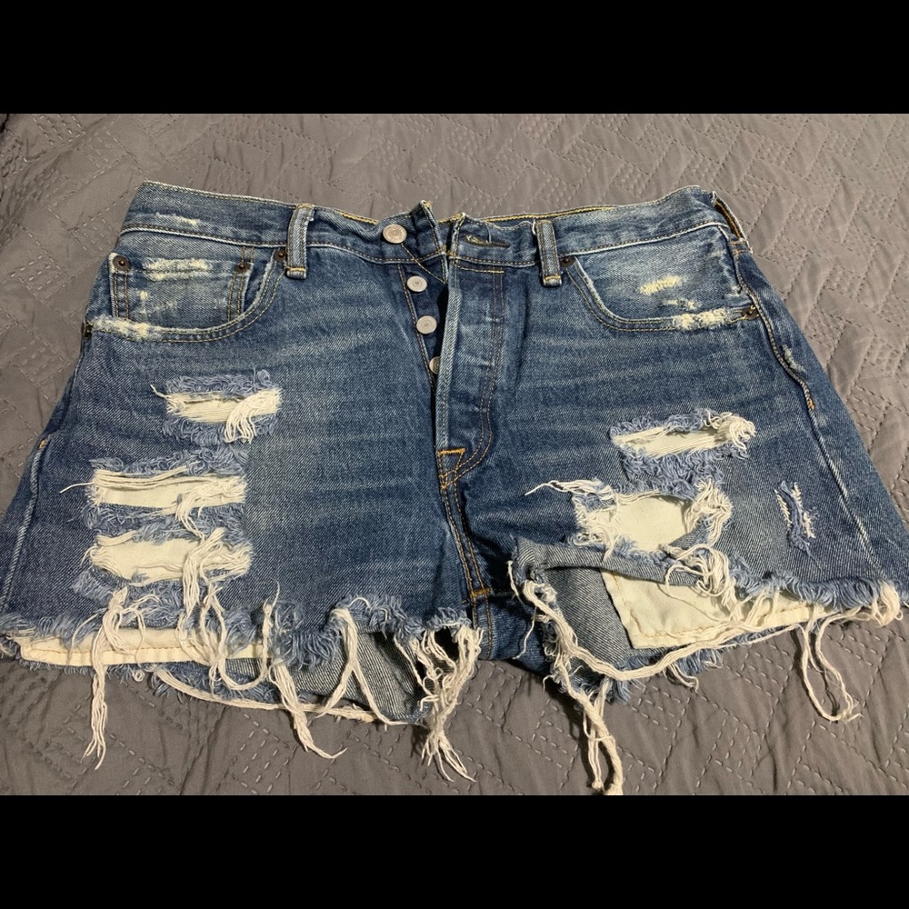 Levi’s distressed shorts.